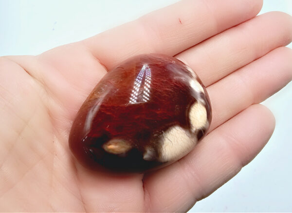 Carnelian Palm Stone, red with white spots, polished, crystal